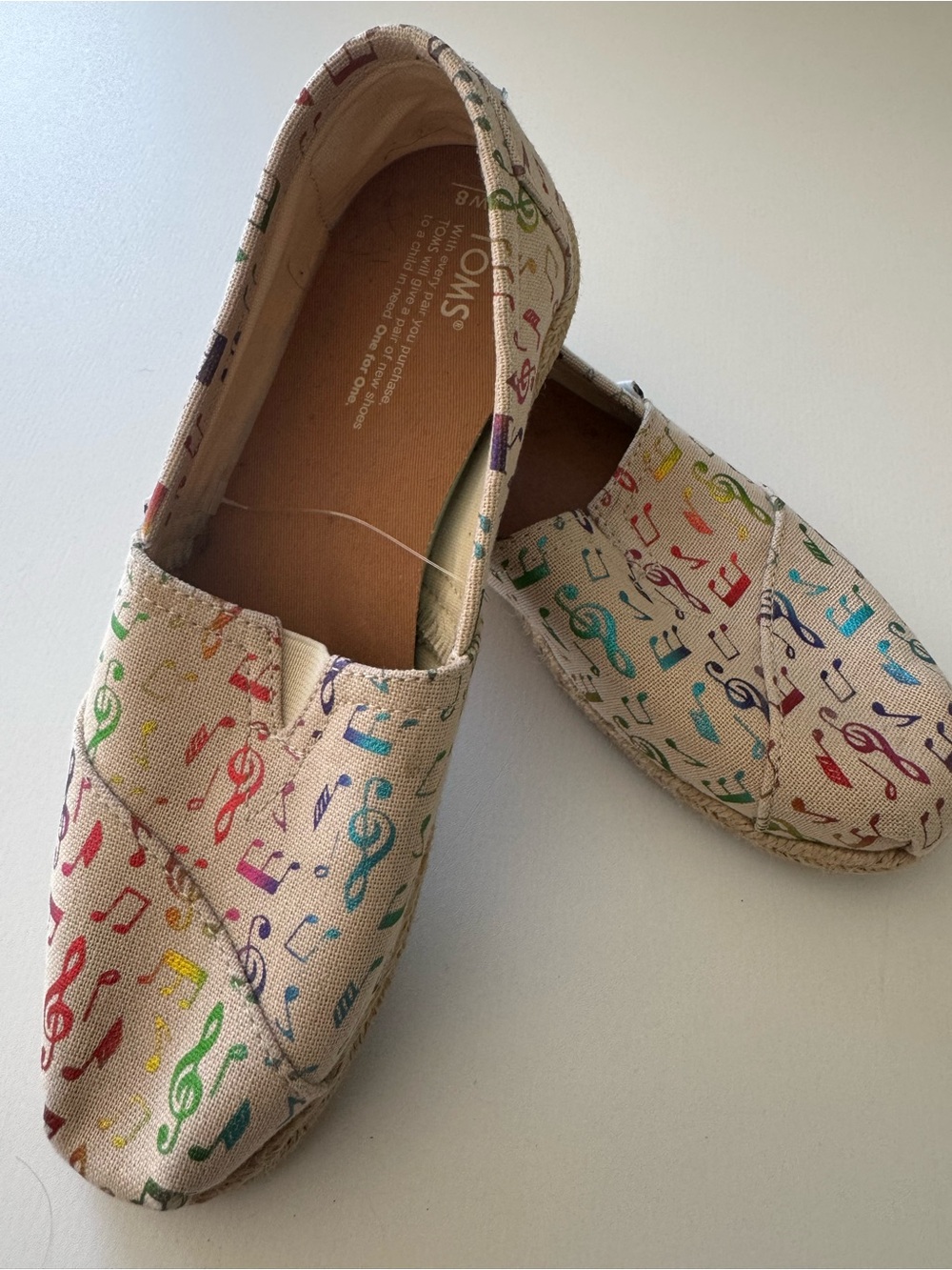 Toms Slip-On Sneakers in Cream with Rainbow Musical Notes size 8